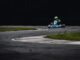 personne conduisant un kart sur une piste de course